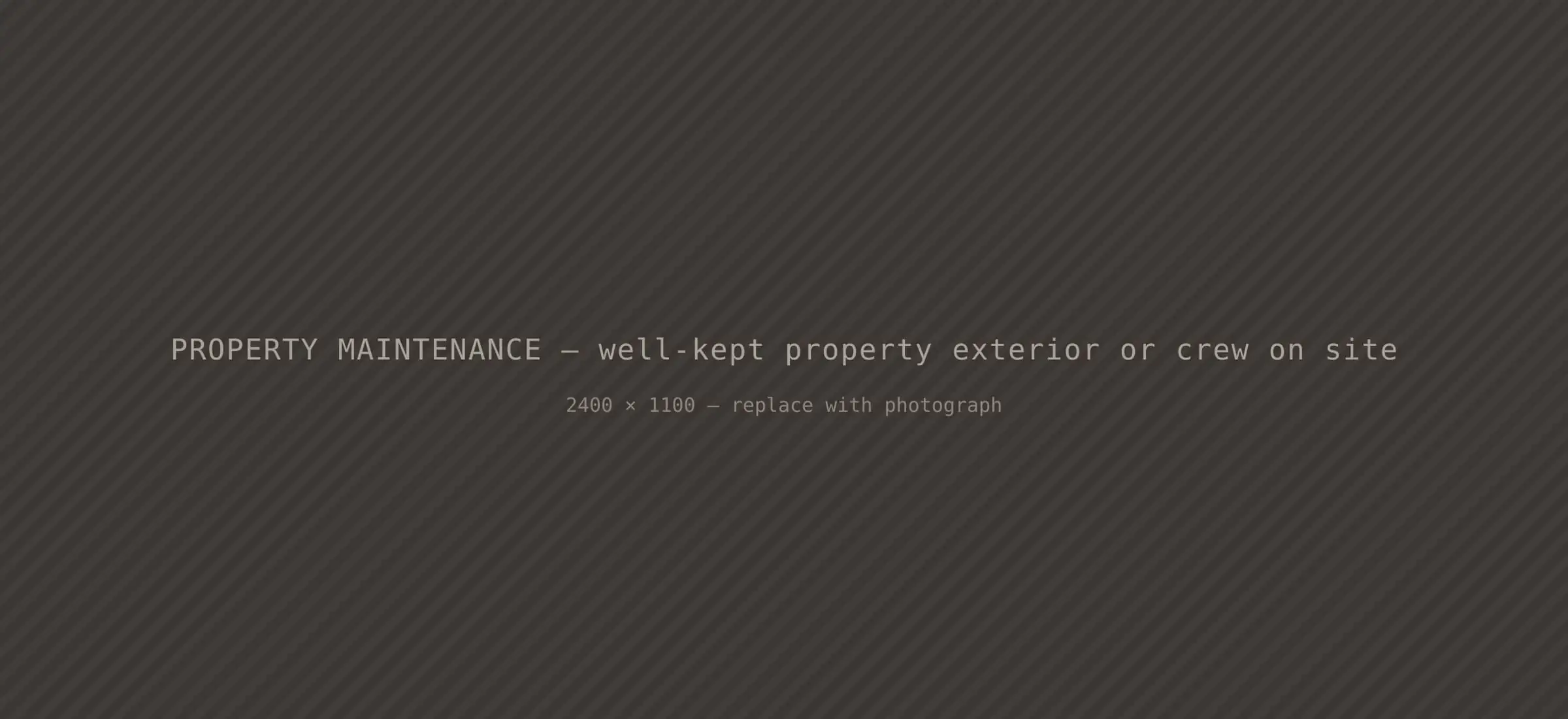 Well-maintained property exterior with a crew on site