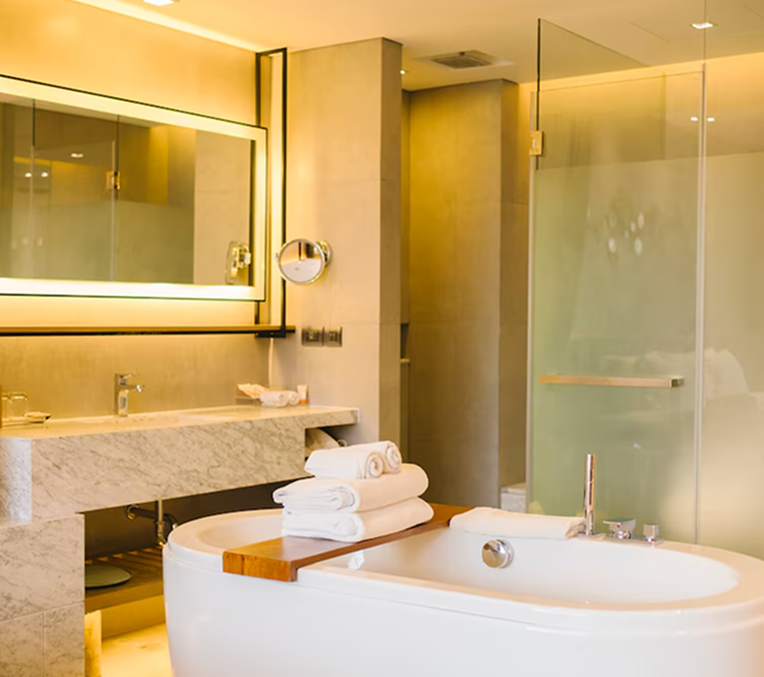 a bathroom with a tub and sink